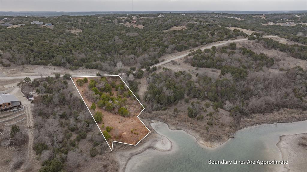 915 Anchor Way Bluff Dale, TX 76433 - Photo 12 of 37 an aerial view of a house with a yard