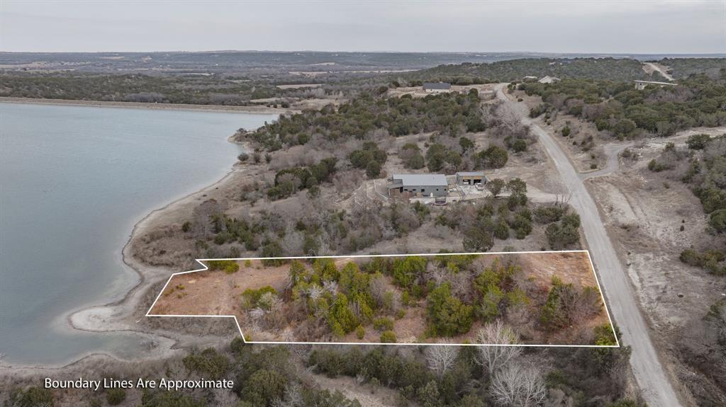 915 Anchor Way Bluff Dale, TX 76433 - Photo 18 of 37 an aerial view of residential houses with outdoor space