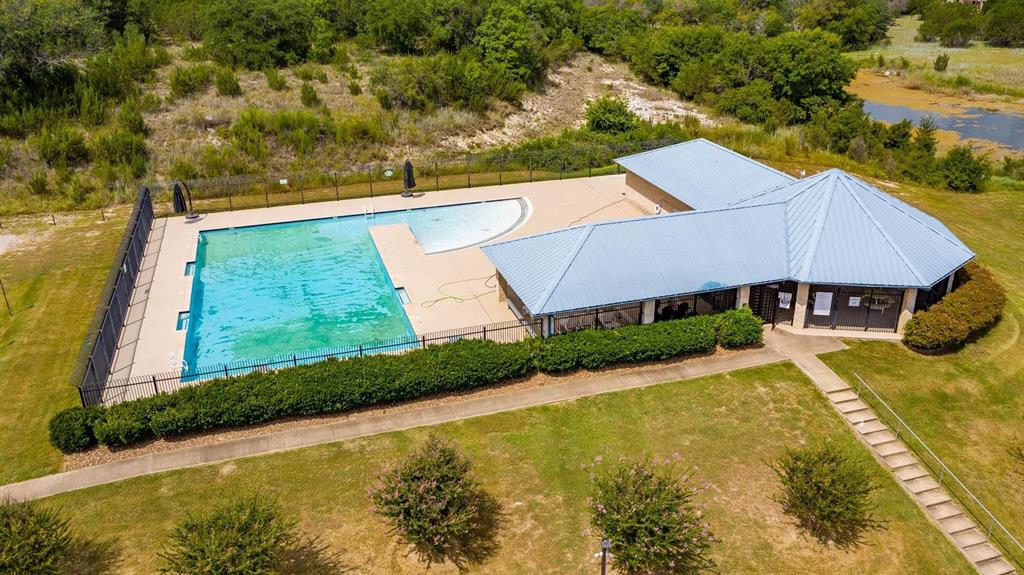 915 Anchor Way Bluff Dale, TX 76433 - Photo 30 of 37 an aerial view of house with yard swimming pool and outdoor seating