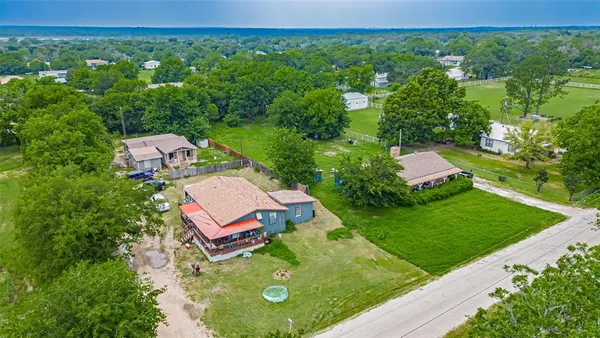 an aerial view of a house with garden