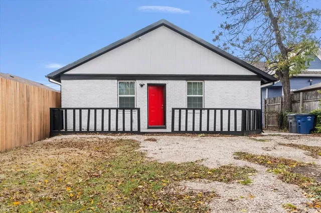 a house with yard in front of it