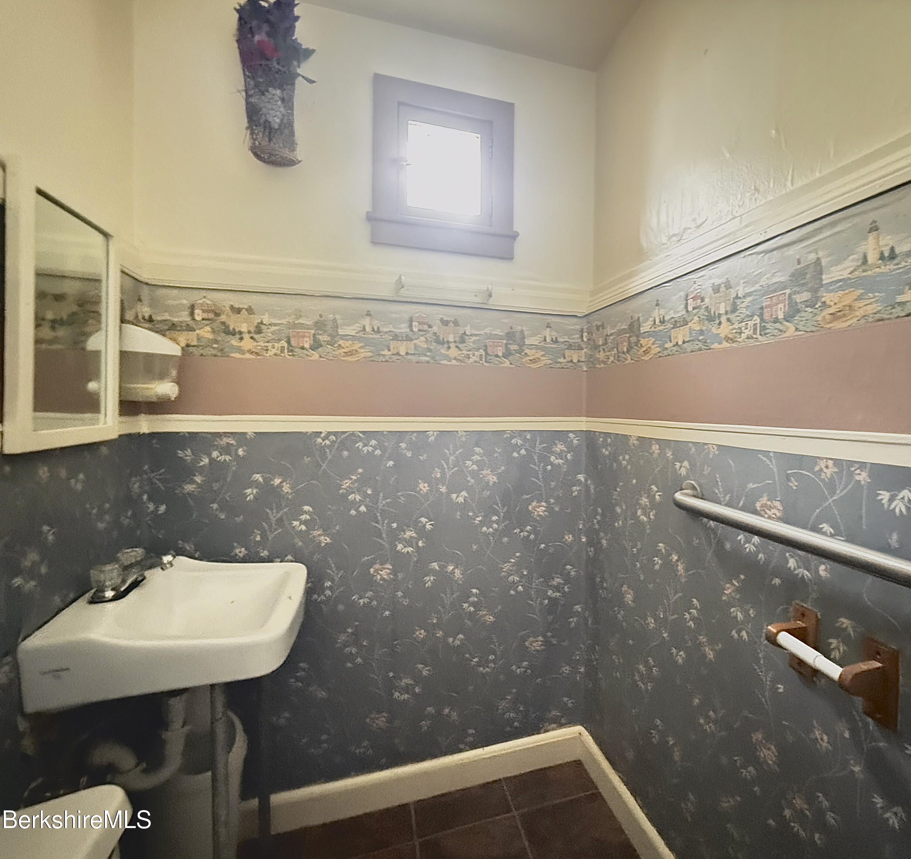 9 Depot Street Monroe, MA 01350 - Photo 16 of 30 a bathroom with a sink and a mirror