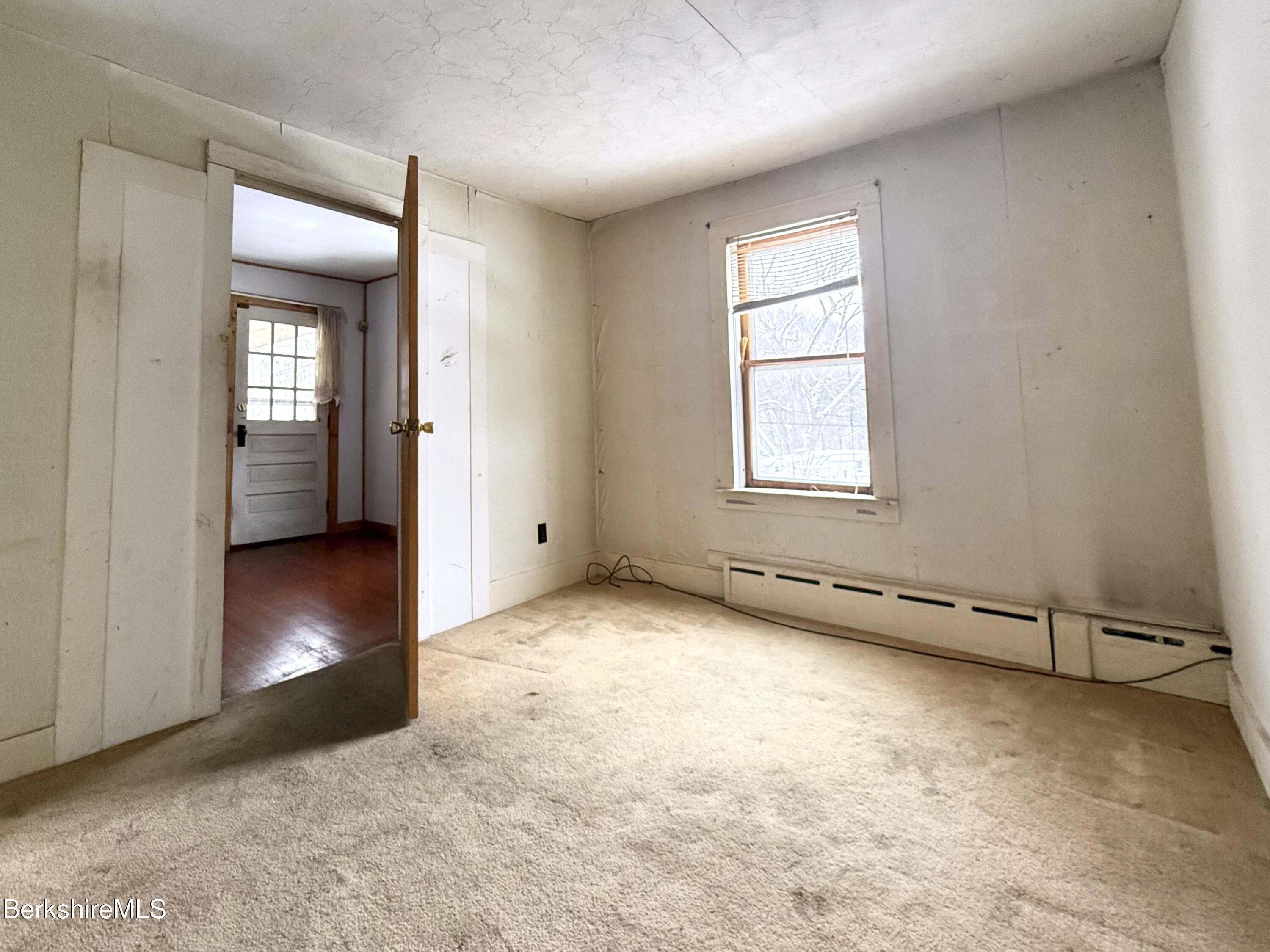 9 Depot Street Monroe, MA 01350 - Photo 27 of 30 an empty room with windows and closet