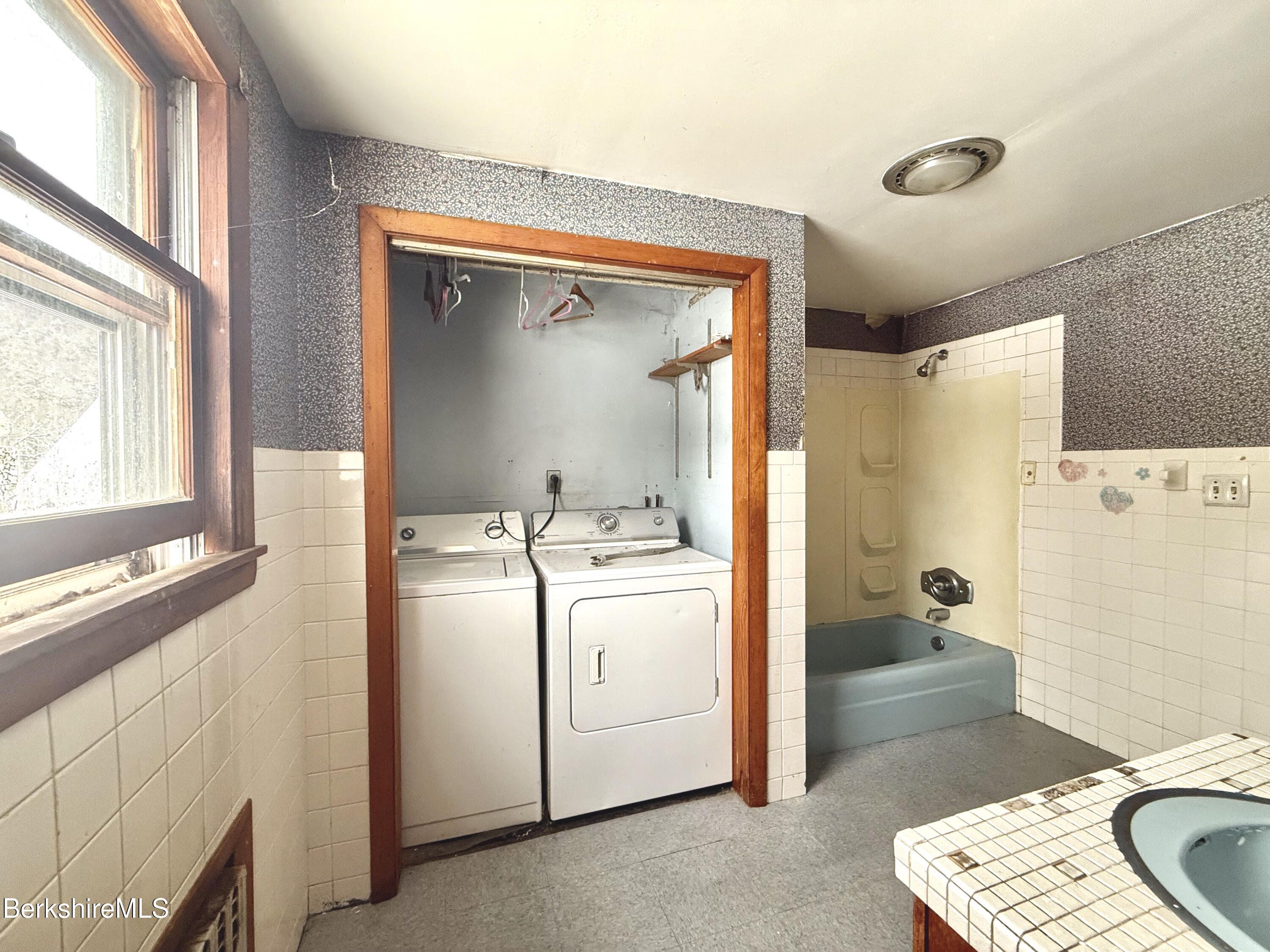 9 Depot Street Monroe, MA 01350 - Photo 5 of 30 a bathroom with a sink a toilet and a mirror