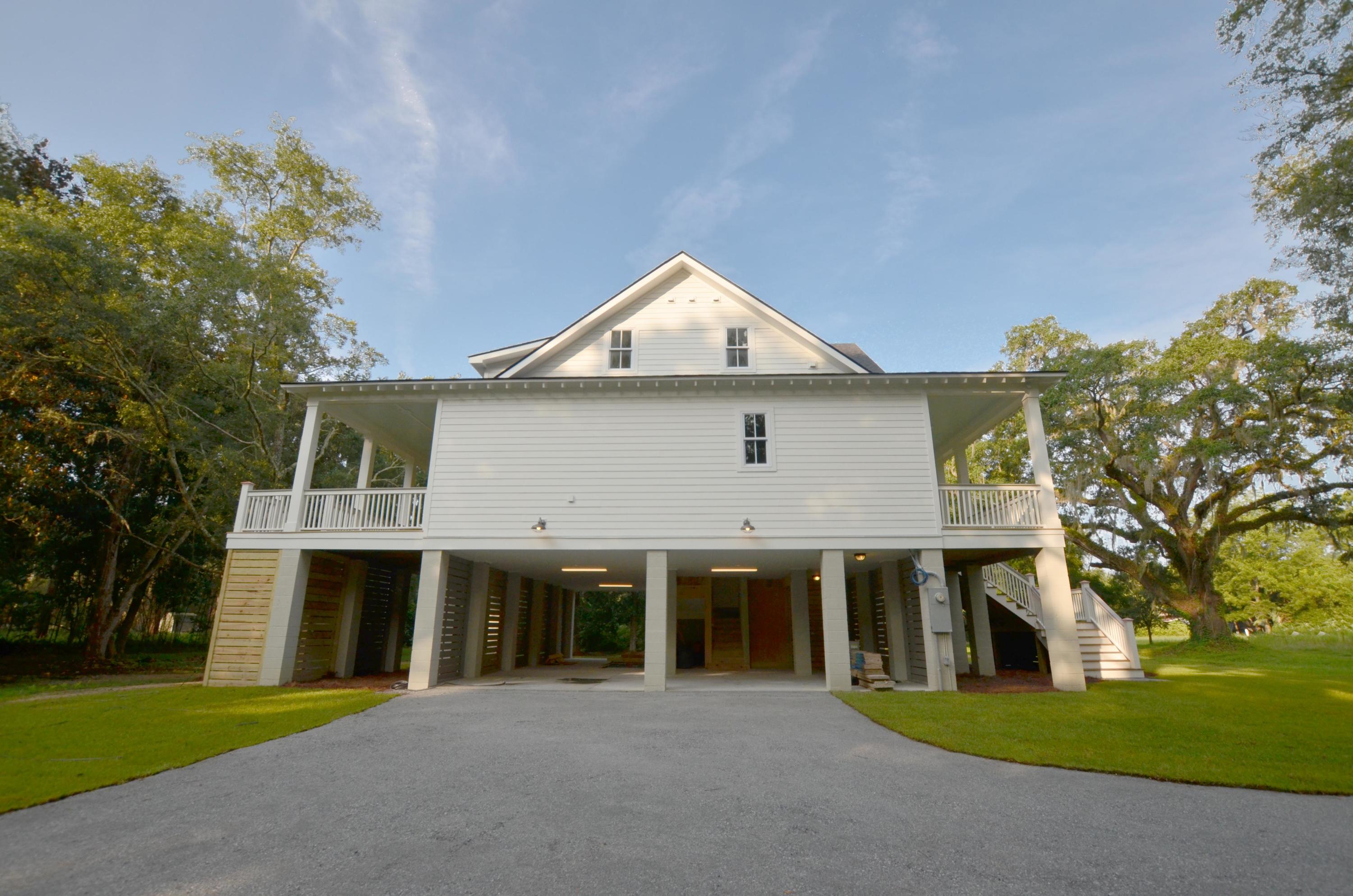 325 Mercantile Road McClellanville, SC 29458 - Photo 31 of 33 House from Left