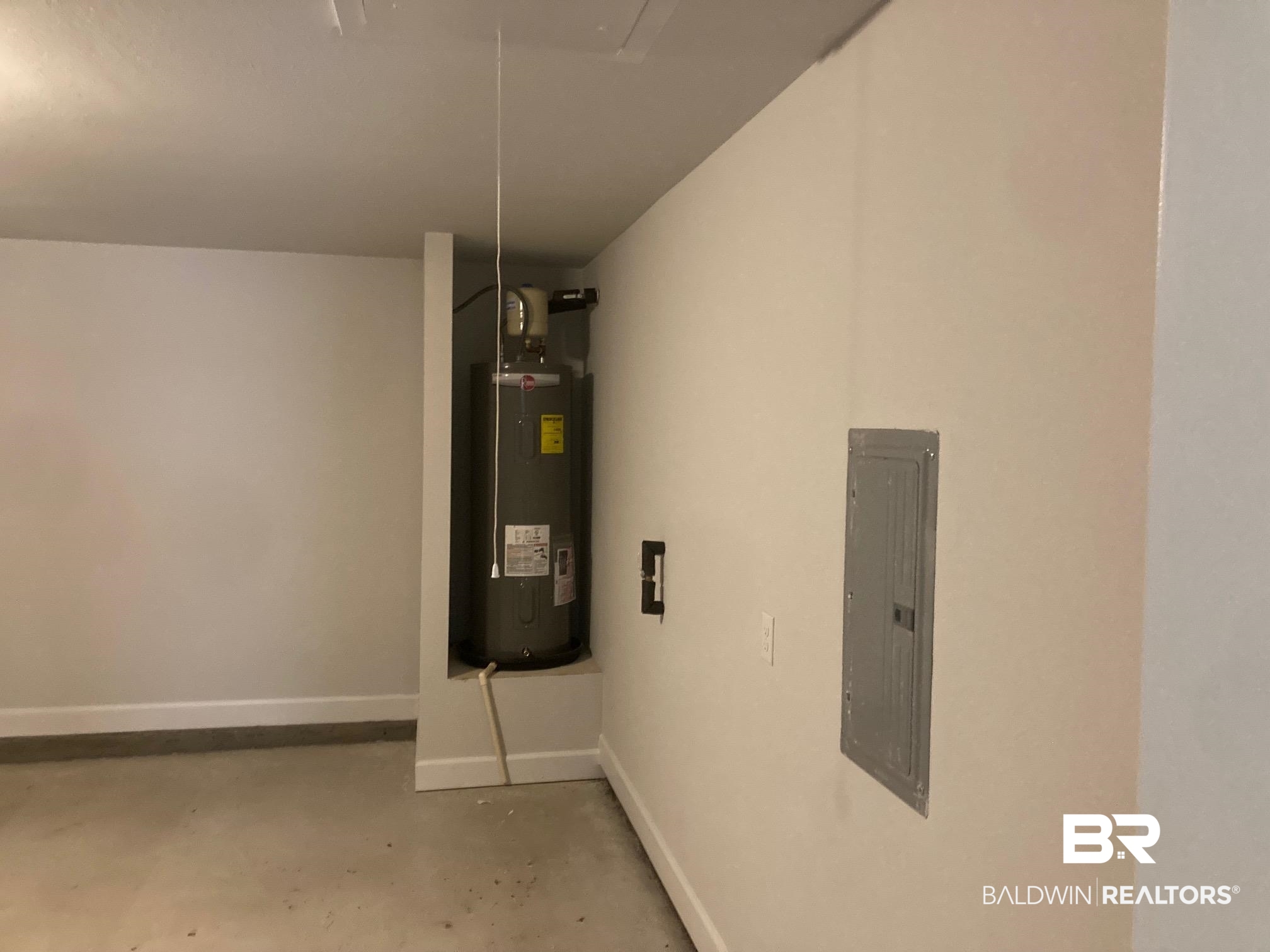 649 Revere Street Foley, AL 36535 - Photo 16 of 18 Utilities with electric water heater and electric panel