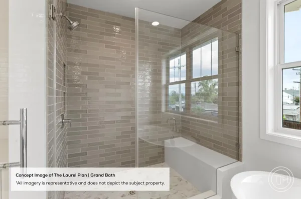 a bathroom with a shower a toilet and sink
