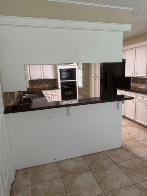 6026 Coral Ridge Road Houston, TX 77069 - Photo 9 of 34 Good space in the kitchen to cook for your family and friends.