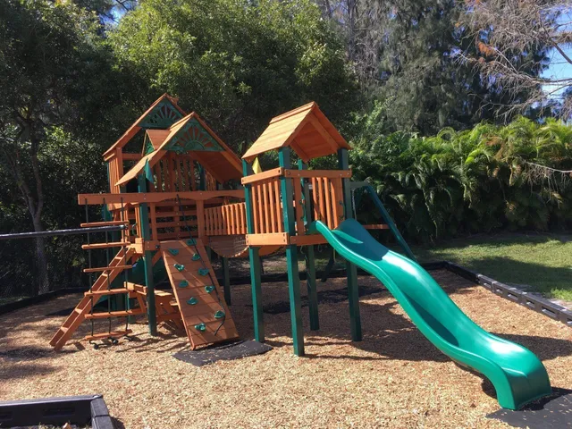 a view of outdoor space with a slide