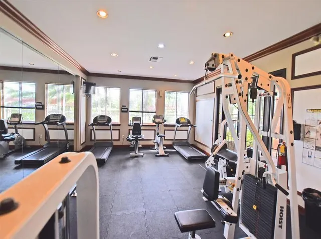 a view of a room with gym equipment