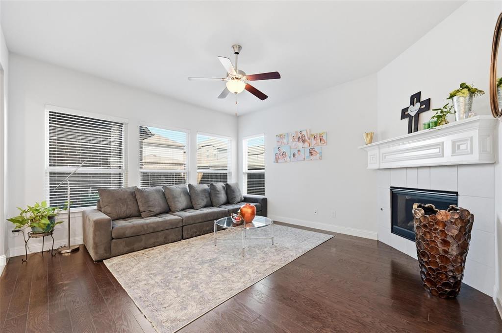 1074 James Court Allen, TX 75013 - Photo 5 of 22 a living room with furniture and a fireplace