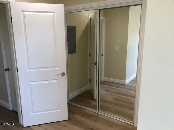 a bathroom with a glass shower door