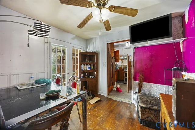 a room with furniture and flat screen tv