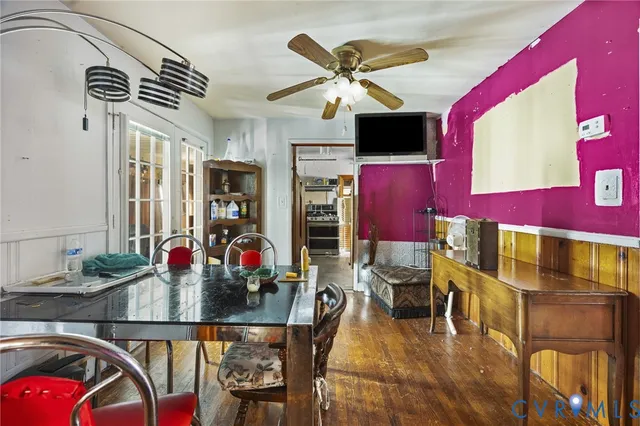 a kitchen with stainless steel appliances granite countertop a stove and a refrigerator