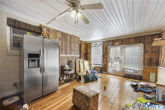 a very nice looking bedroom with a large window