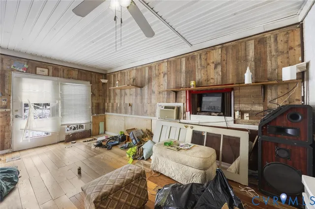 a bed room with furniture and a window