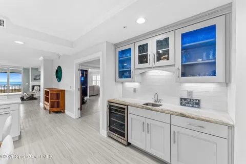 a kitchen with a refrigerator a sink and dishwasher