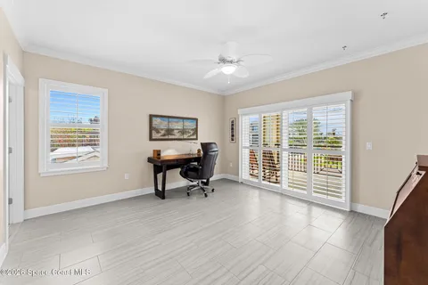 a view of balcony with furniture