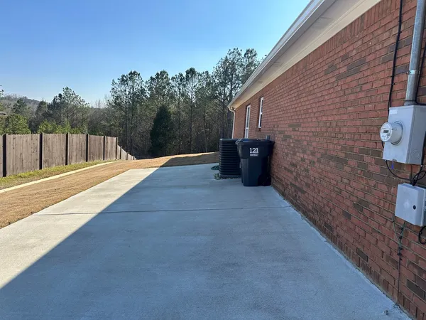 a backyard of a house with lots of green space