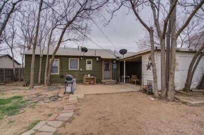 3208 33rd Street Lubbock, TX 79410 - Photo 2 of 14 a view of a house with backyard porch and sitting area