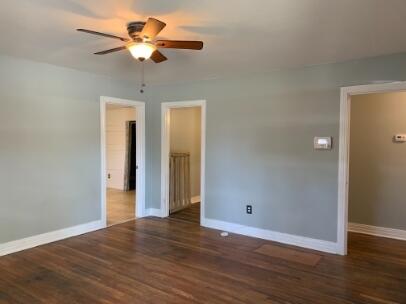 3208 33rd Street Lubbock, TX 79410 - Photo 3 of 14 a view of an empty room with wooden floor