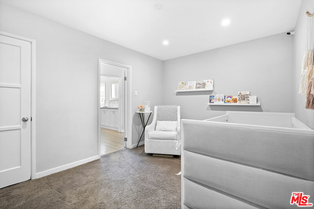 6521 Balcom Avenue Reseda, CA 91335 - Photo 17 of 35 a bedroom with furniture and a window