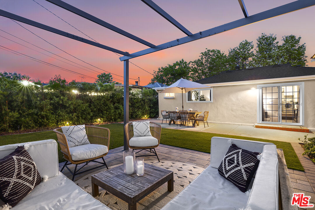 6521 Balcom Avenue Reseda, CA 91335 - Photo 2 of 35 a view of a patio with couches chairs and a table