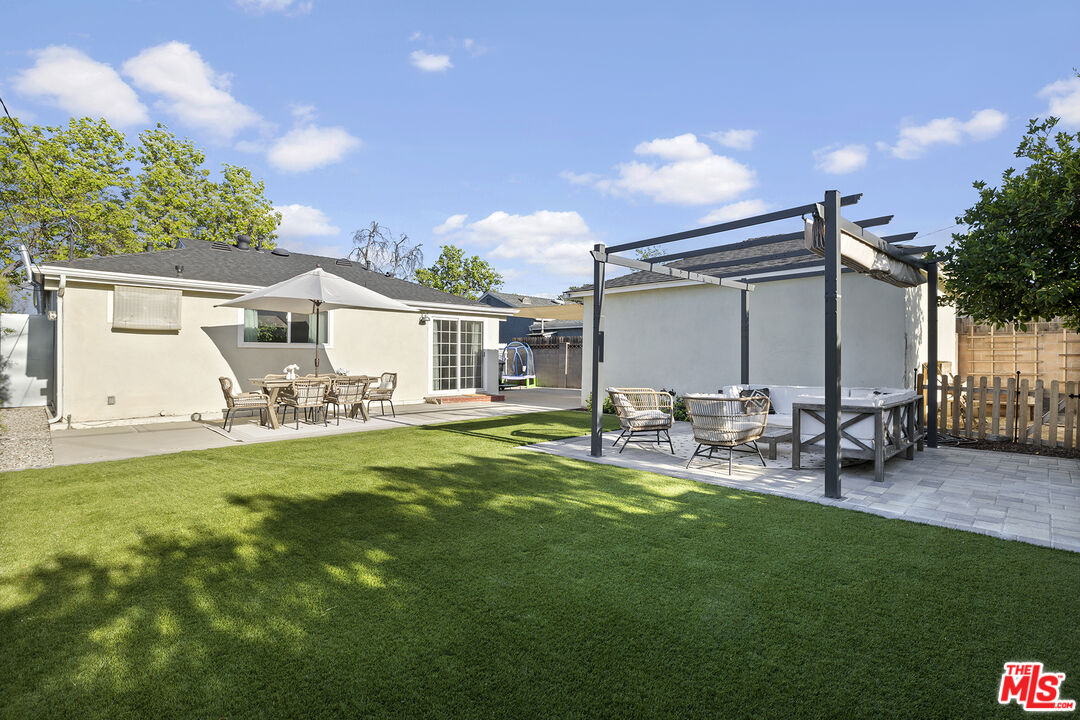 6521 Balcom Avenue Reseda, CA 91335 - Photo 29 of 35 a view of a house with backyard and sitting area