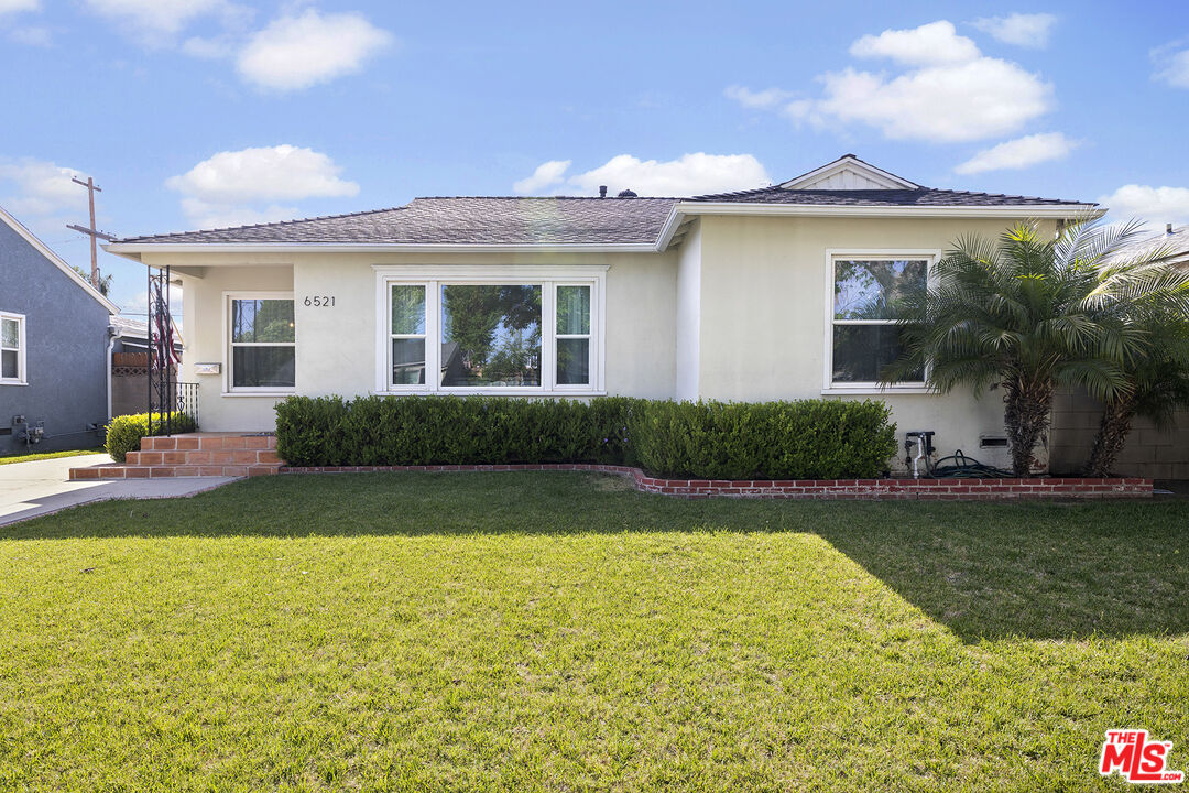 6521 Balcom Avenue Reseda, CA 91335 - Photo 3 of 35 a view of a house with swimming pool