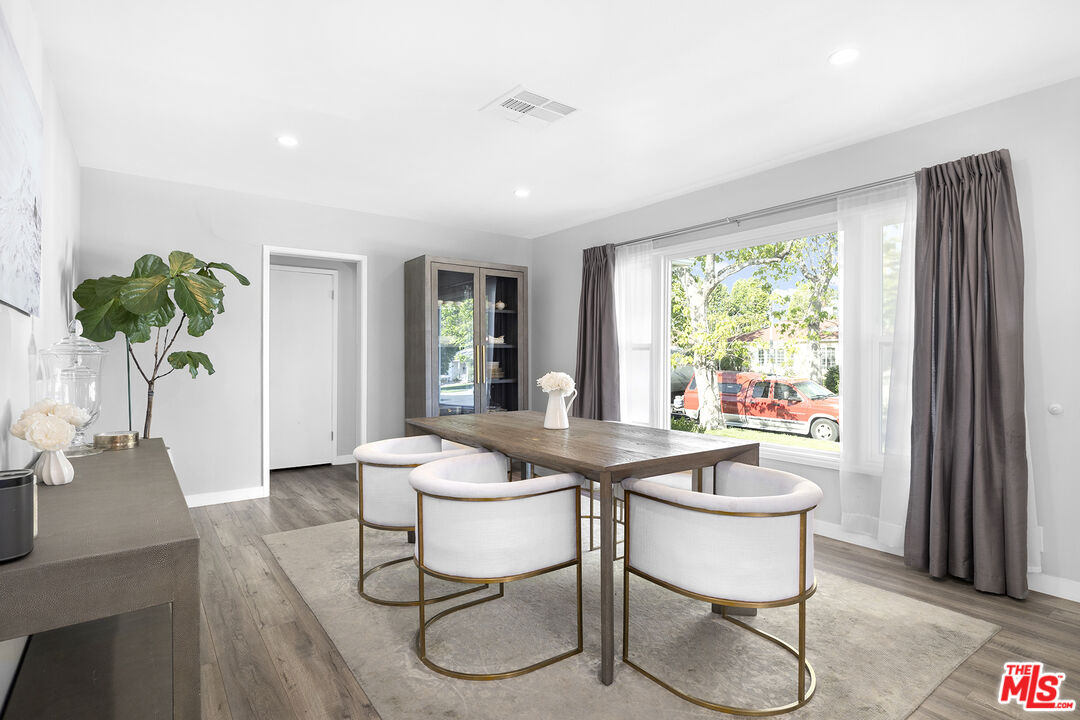 6521 Balcom Avenue Reseda, CA 91335 - Photo 6 of 35 a dining room with furniture and window
