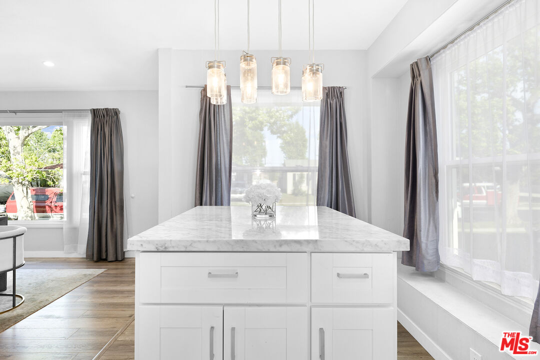 6521 Balcom Avenue Reseda, CA 91335 - Photo 7 of 35 a bathroom with a sink vanity granite and a mirror
