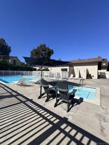 a view of house with outdoor seating space