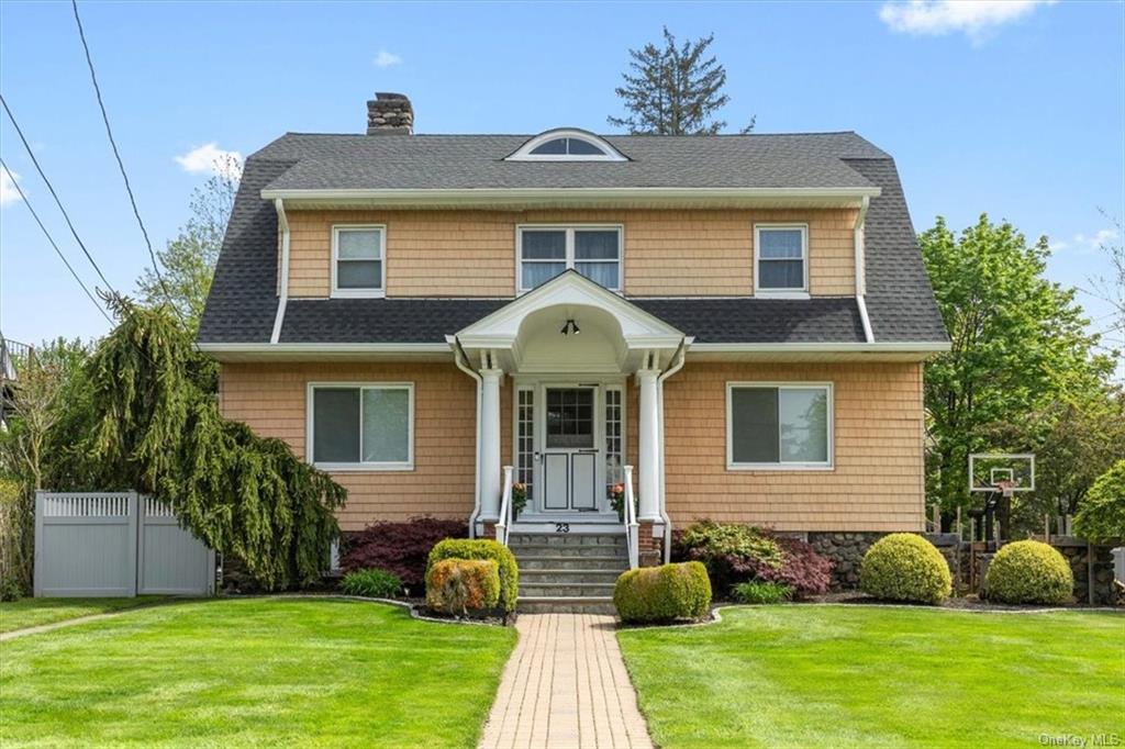 Welcome to 23 Midland Avenue -  a beautiful 1924 colonial with a lush lawn and landscaping