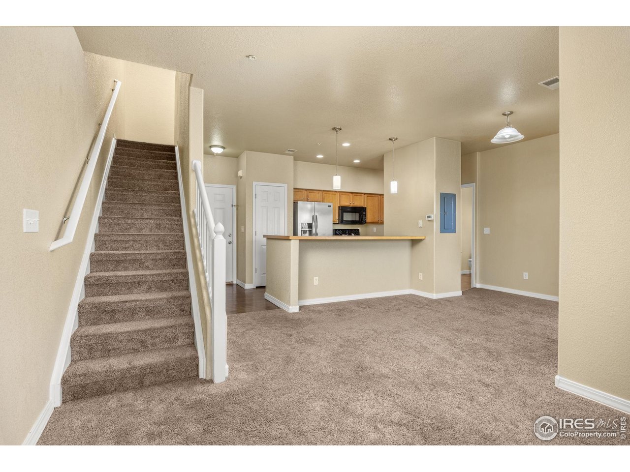a view of a kitchen with kitchen and a sink