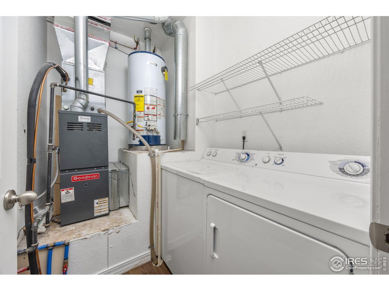 1900 68th Avenue, Unit 810 Greeley, CO 80634 - Photo 17 of 24 a utility room with dryer and washer