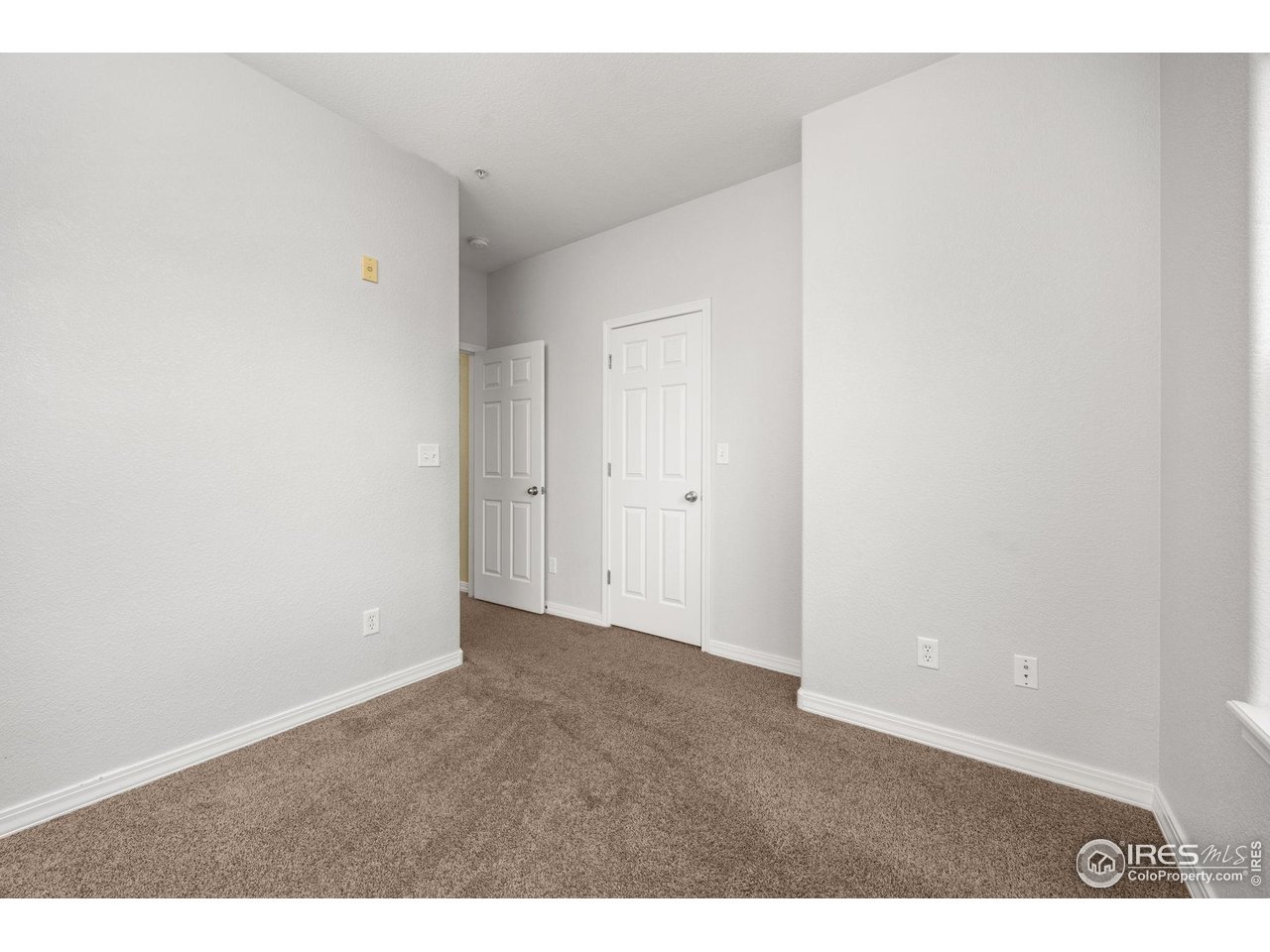 1900 68th Avenue, Unit 810 Greeley, CO 80634 - Photo 19 of 24 a view of an empty room