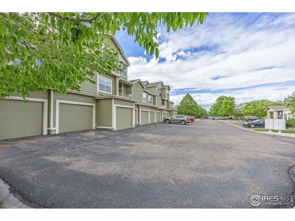 a view of a house with a parking space