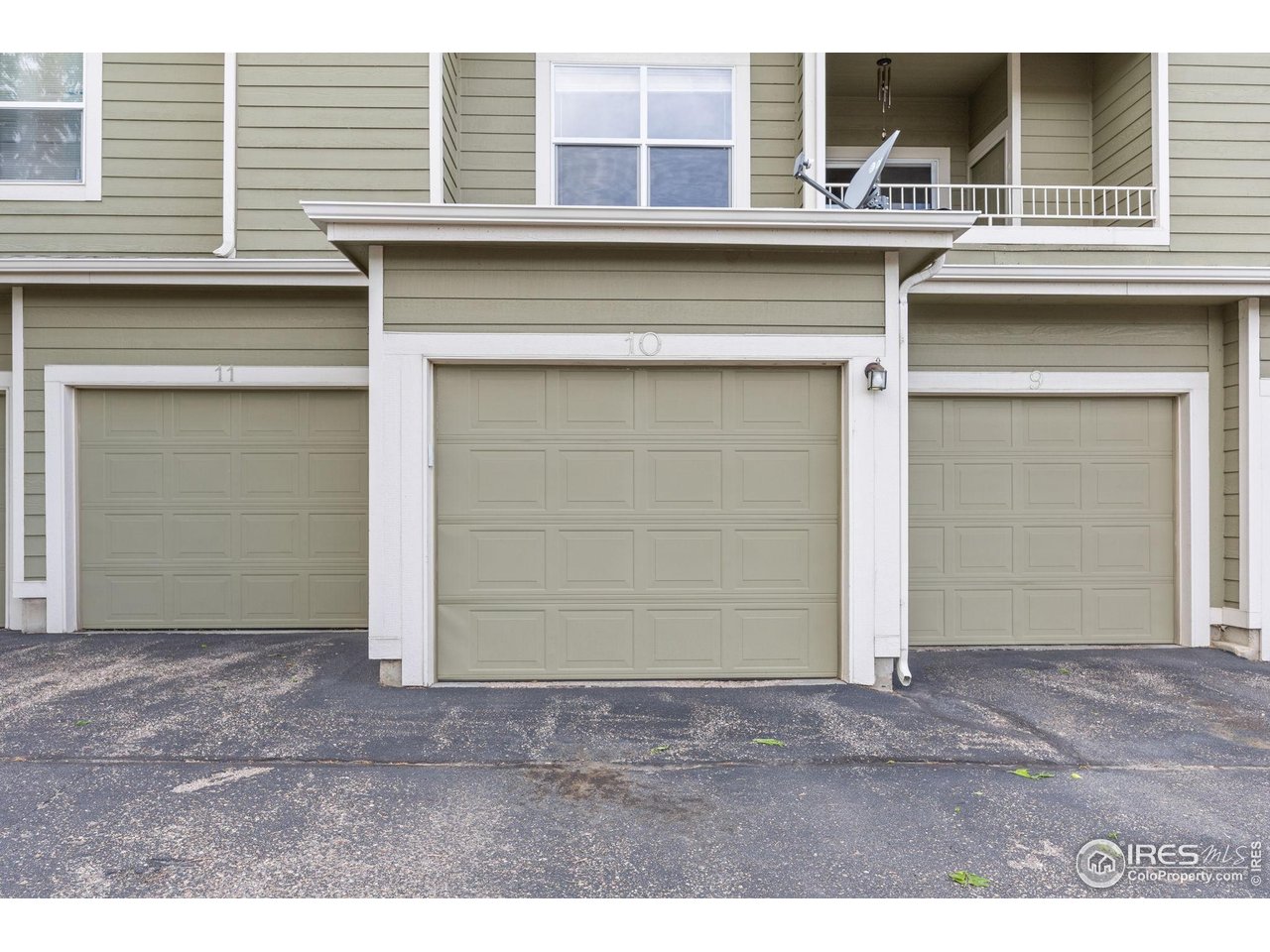 1900 68th Avenue, Unit 810 Greeley, CO 80634 - Photo 22 of 24 a view of a house with a parking space