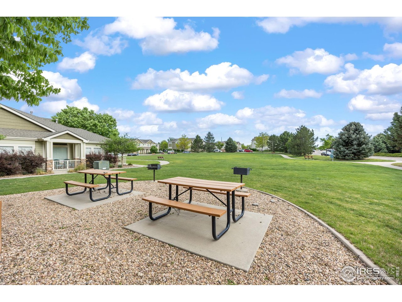 1900 68th Avenue, Unit 810 Greeley, CO 80634 - Photo 24 of 24 a view of a bench in the garden