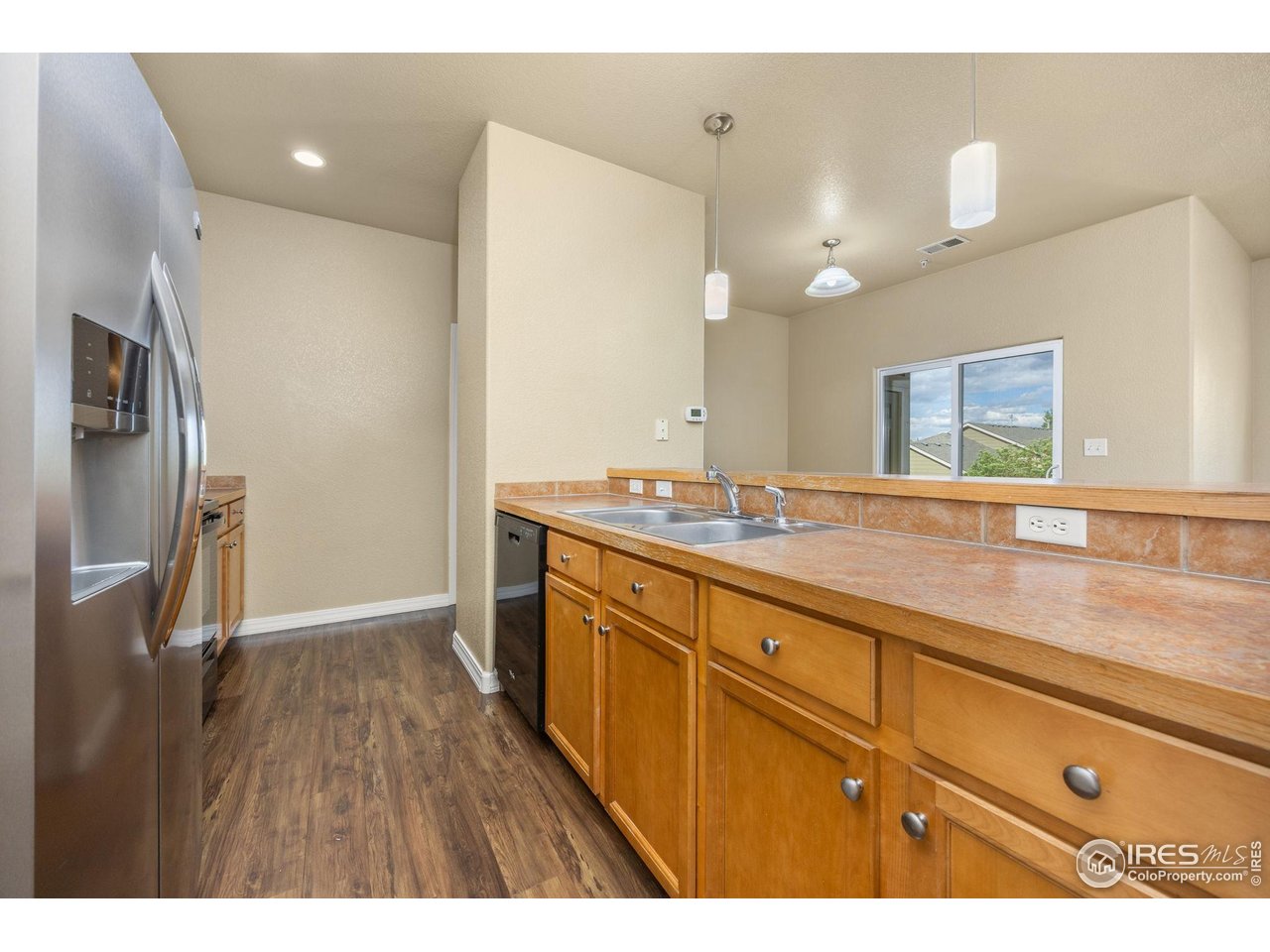 1900 68th Avenue, Unit 810 Greeley, CO 80634 - Photo 8 of 24 a bathroom with a sink double vanity and a mirror