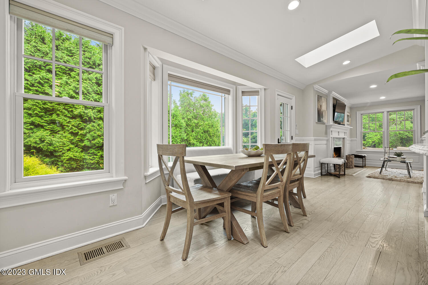 26 Twin Lakes Lane Riverside, CT 06878 - Photo 15 of 38 a view of a dining room with furniture window and outside view
