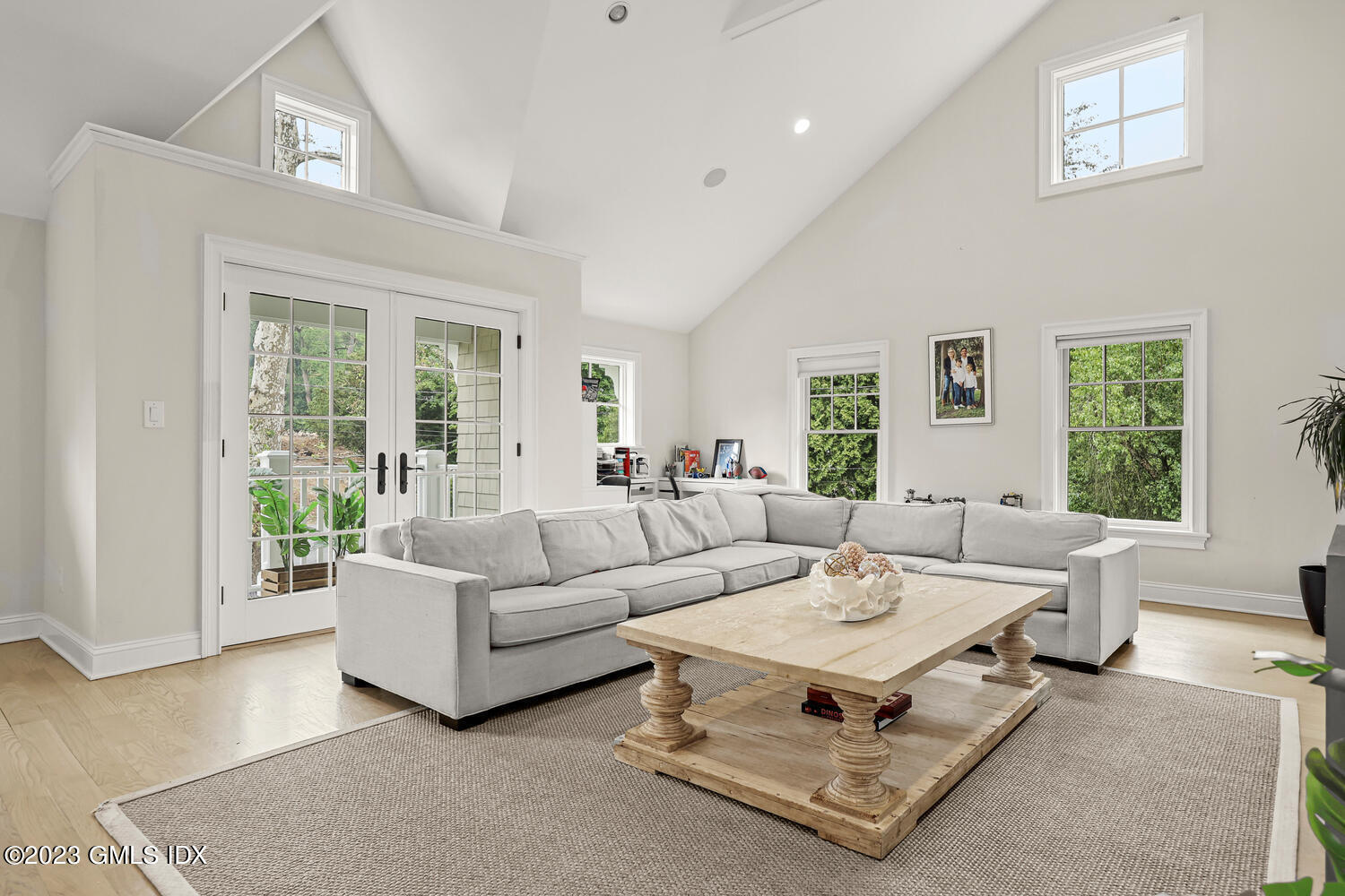 26 Twin Lakes Lane Riverside, CT 06878 - Photo 25 of 38 a living room with furniture and a large window