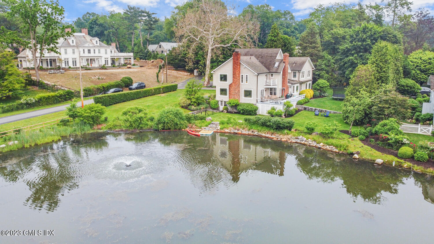 26 Twin Lakes Lane Riverside, CT 06878 - Photo 4 of 38 a aerial view of a house with a lake view