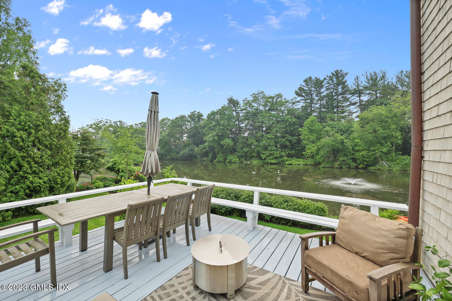 26 Twin Lakes Lane Riverside, CT 06878 - Photo 5 of 38 a view of a balcony with mountain view and wooden floor