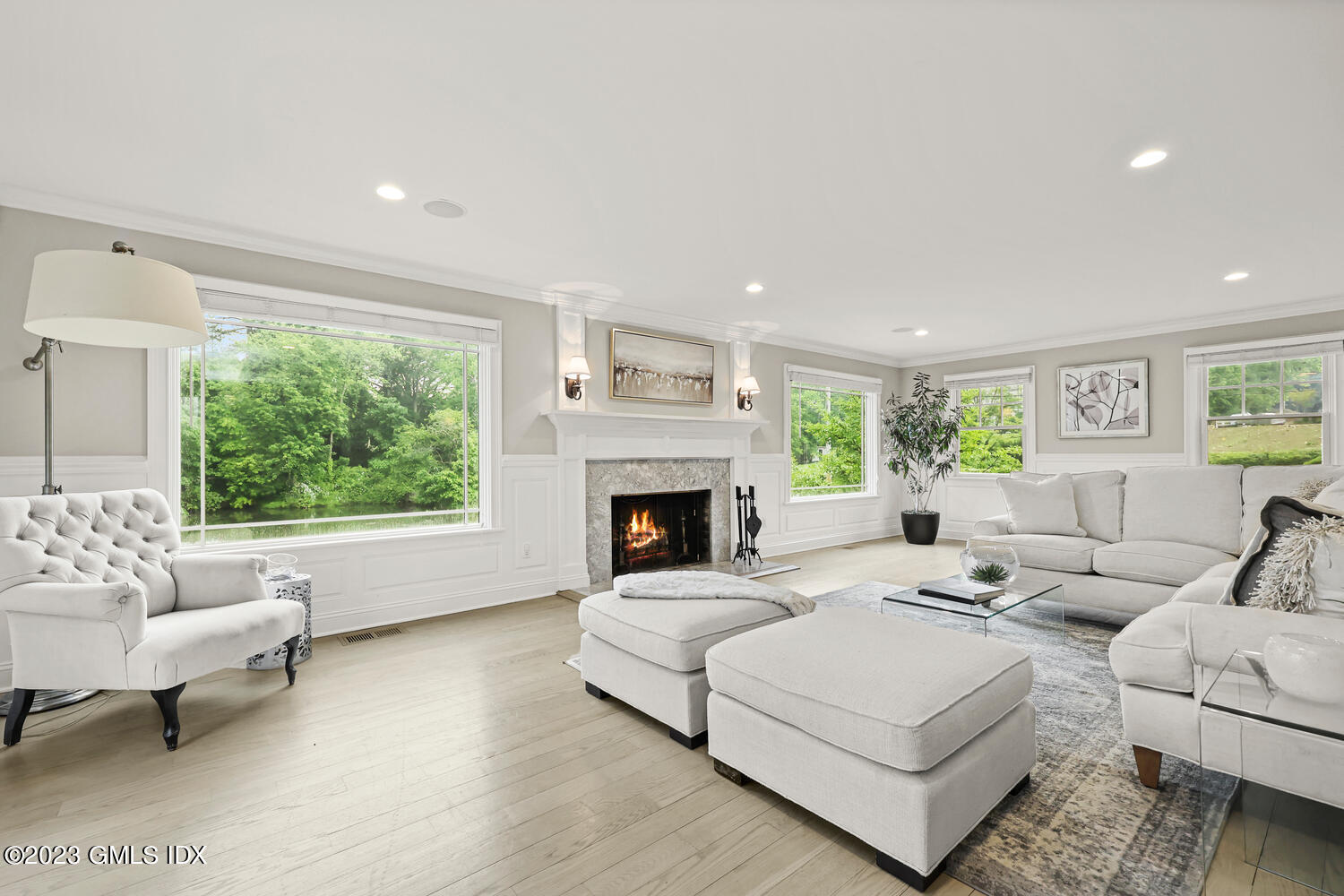 26 Twin Lakes Lane Riverside, CT 06878 - Photo 6 of 38 a living room with furniture and a fireplace