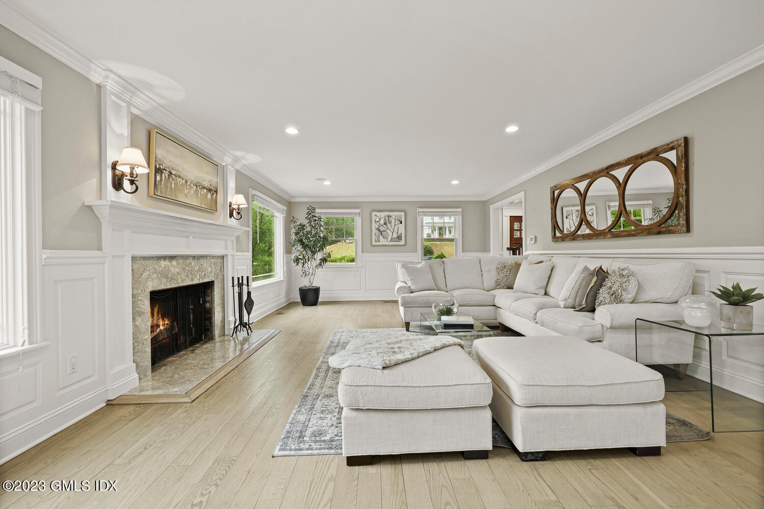 26 Twin Lakes Lane Riverside, CT 06878 - Photo 8 of 38 a living room with furniture and a fireplace