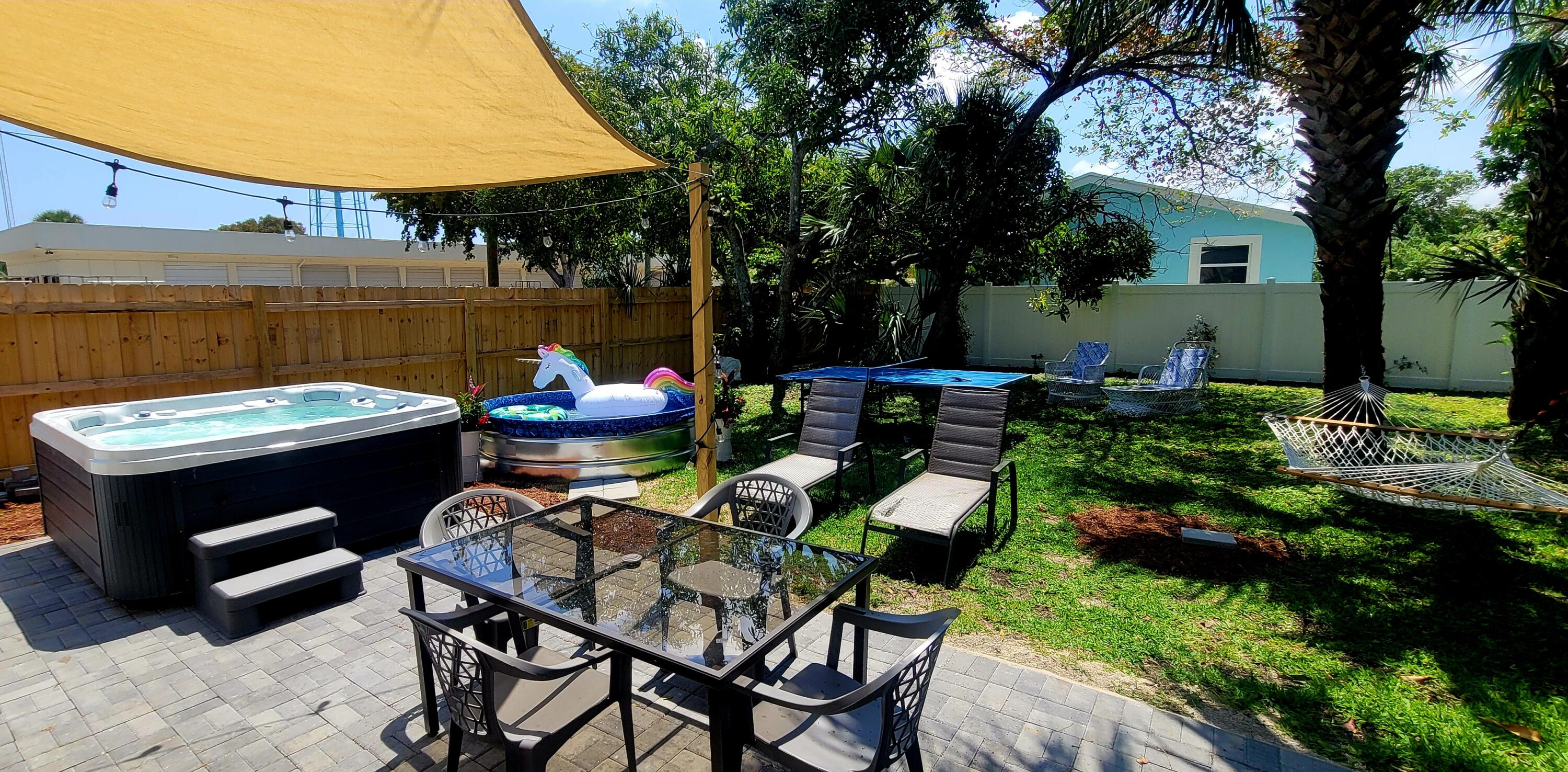 408 Southwest 4th Street Delray Beach, FL 33444 - Photo 27 of 31 a view of a chairs and tables in the patio
