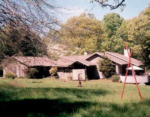 20 Indian Hill Road Wilton, CT 06897 - Photo 1 of 1 a view of house with a yard