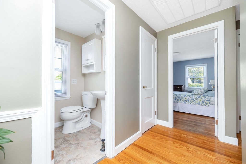 18 Redstone Drive Springfield, MA 01118 - Photo 16 of 31 a bathroom with a toilet sink and shower
