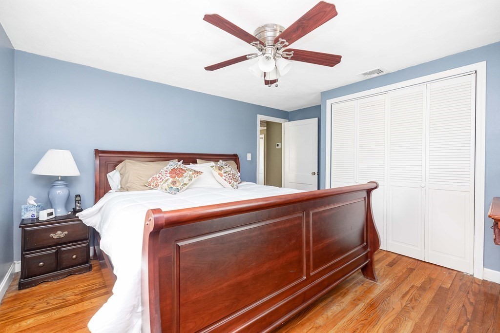 18 Redstone Drive Springfield, MA 01118 - Photo 17 of 31 a bedroom with a bed and a tv